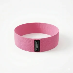 Non-slip pink fabric resistance band for glute bridge, squats, and lower body home workout.