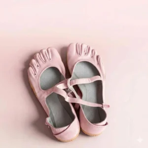 Pair of pink five-finger minimalist shoes for women's yoga, Pilates, and dance with non-slip soles and elastic straps.