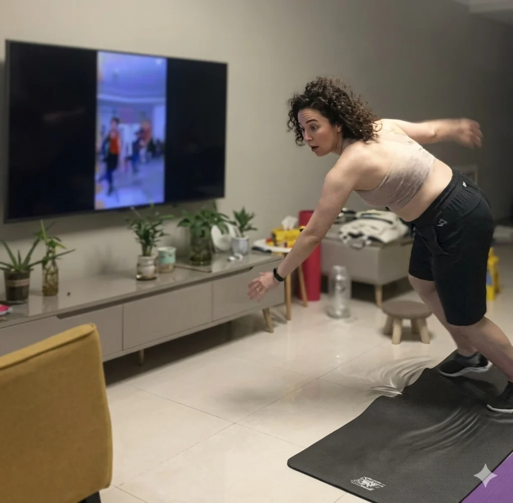 Stop Knee Pain: My Guide to a Safe, Low-Impact Home Workout 2 A woman struggling with a slippery yoga mat during a low-impact home workout, highlighting potential slip hazards.